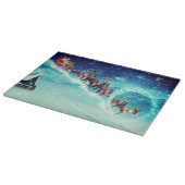 サンタ飛んでいるクロースとトナカイ カッティングボード (角)