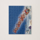 サンタ飛んでいるスレイwトナカイ ジグソーパズル (縦)