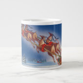 サンタ飛んでいるスレイwトナカイ ジャンボコーヒーマグカップ (正面)