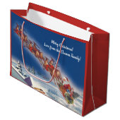 サンタ飛んでいるスレイwトナカイ ラージペーパーバッグ (正面アングル)