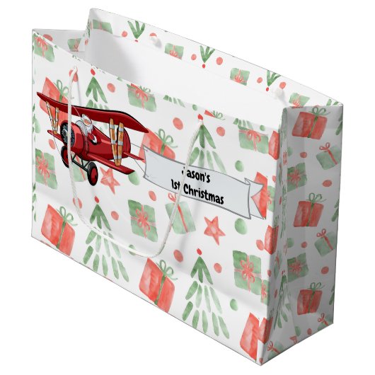 サンタ飛んでいるー飛行機、初めてのクリスマスパーソナライズされた ラージペーパーバッグ (正面アングル)