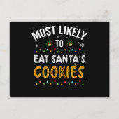 サンタ食べのクッキーに最も見込みのあるクリスマス ポストカード (正面)
