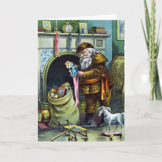 サンタ・クラウスのヴィンテージクリスマスのおもちゃつきストッキング シーズンカード (正面)