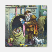 サンタ・クラウスのヴィンテージクリスマスのおもちゃつきストッキング マグネット (正面)