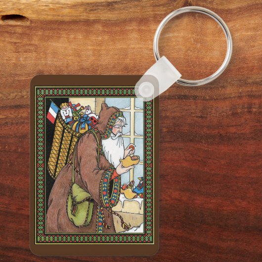 サンタ・クラウス玩具が下駄の靴を履くビンテージクリスマス キーホルダー (裏面)