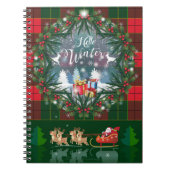 サンタ・クロースはトナカイが率いる木馬に乗っている ノートブック (正面)