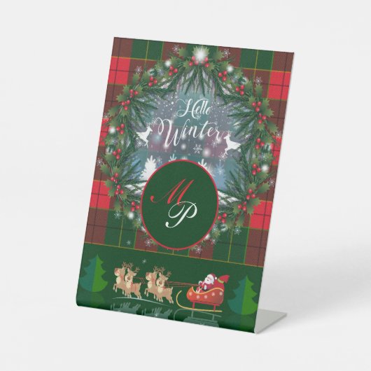 サンタ・クロースはトナカイが率いる木馬に乗っている 台座サイン (正面)