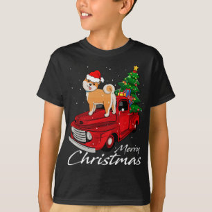 サンタ・ドッグが赤トラックに乗るクリスマスパジャマの衣装 Tシャツ
