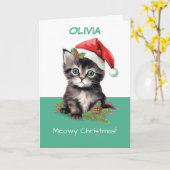 サンタ・ハットのミョイ・クリスマスを着たかわいい猫 カード (黄色い花)