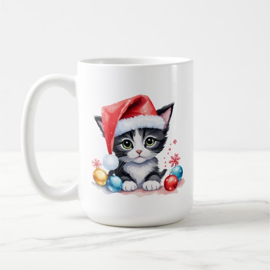 サンタ・ハット・クリスマスに登場する可愛い白黒の子猫 コーヒーマグカップ (左)