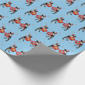 サンタ・ペンギンがプレゼントを交換 ラッピングペーパー (角)