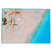 サンディの熱帯ビーチのヒトデの貝殻 ラージペーパーバッグ (裏面)