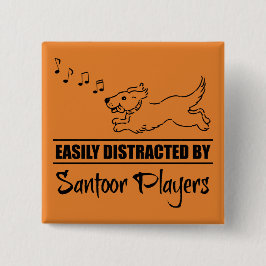 サントオランニングア選手に気を取られやすいの犬 缶バッジ