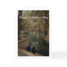 サンビセンテ公園で鴨に餌を与えるカップル