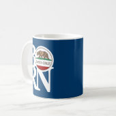 サン生まれタクルーズ11ozマグカップ コーヒーマグカップ (正面左)