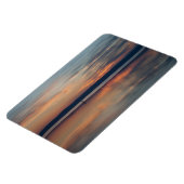 サーファーは岸までボートで漕ぐ マグネット (左側)