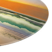 サーフボードサンセットとビーチの男 カッティングボード (角)