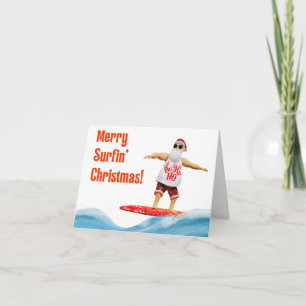 サーフメリーボード上のサーフィンクリスマスサンタ カード