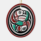 サーモンを追いかける北西太平洋沿岸のカワウソ セラミックオーナメント (左)