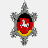 ザクセン地方のスノーフレーク・ピュータークリスマス国旗または スノーフレークピューターオーナメント (左)