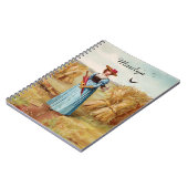 ザ・ウーマン・イン・ザ・ウィート・フィールド・ノート ノートブック (左側)