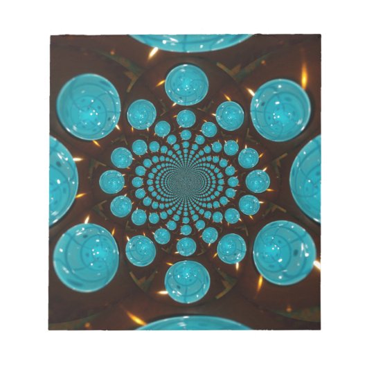 シアンライトの目まいがする表示万華鏡のように千変万化するパターンアート ノートパッド (正面)