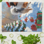 シェットランド走シェプドッグのクリスマス帽で雪 キッチンタオル (折り畳み)