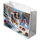 シェットランド走シェプドッグのクリスマス帽で雪 ラージペーパーバッグ (裏面アングル)