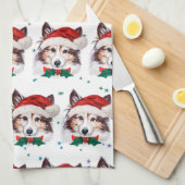 シェットランド・ シープドッグ犬がクリスマススターを育てる キッチンタオル (四つ折り)