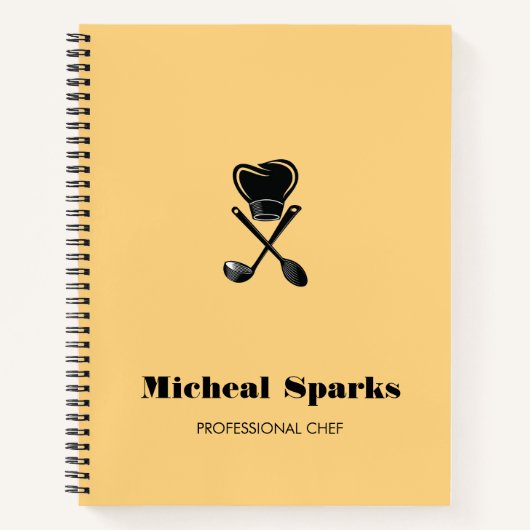 シェフの帽子とスプーンのシルエット ベージュ ノートブック (正面)