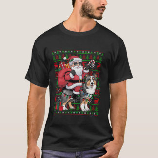 シェルティーに乗るサンタのユーモラスなクリスマス電飾 面白い Tシャツ