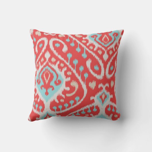 シックでエレガントな赤およびターコイズの種族のイカットは印刷します クッション (裏面)