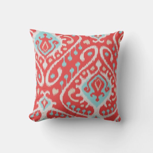 シックでエレガントな赤およびターコイズの種族のイカットは印刷します クッション (正面)