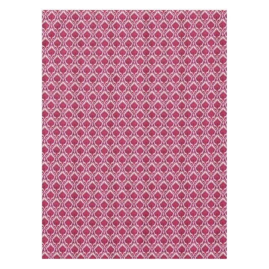 シックで多彩な赤いおよび紫色のイカット種族パターン テーブルクロス (正面)