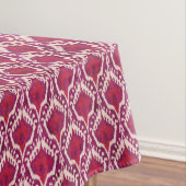 シックで多彩な赤いおよび紫色のイカット種族パターン テーブルクロス (インサイチュ)
