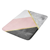 シックで黒い大理石のピンク色のブロックおよび金ゴールドのストライプ バスマット (アングル)