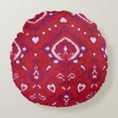 シックなカラフル赤と紫のイカットの部族模様 ラウンドクッション (正面)