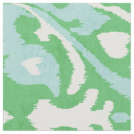 シックなグリーンとターコイズイカットの部族パターン ファブリック