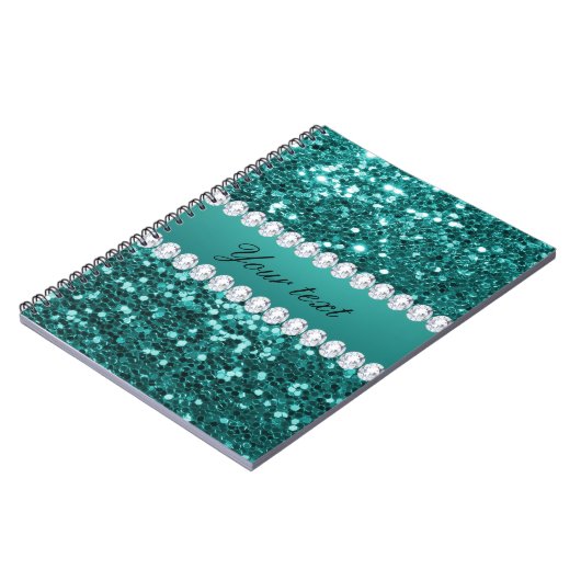 シックなティール(緑がかった色)のフェイクなグリッターおよびダイヤモンド ノートブック (左側)