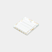 シックな青及び金ぱくモノグラムのメモ帳からのノート ポストイット (アングル)