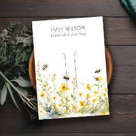 シックな黄色のワイルドフラワーのまわりにヘアクリップディスプレイ 名刺