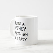 シドニーのスポーツファンであること コーヒーマグカップ (正面左)