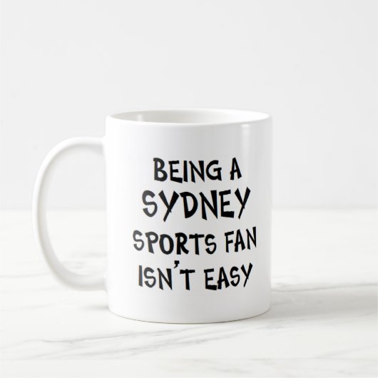 シドニーのスポーツファンであること コーヒーマグカップ (左)