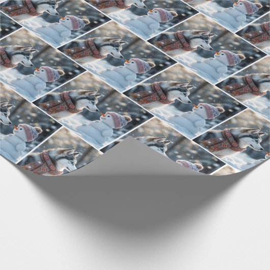 シベリアのハスキーが雪だるまを見る ラッピングペーパー (角)