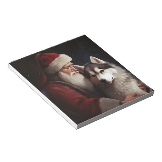 シベリアハスキーとサンタクロースフェスティバルクリスマス ノートパッド (アングル)