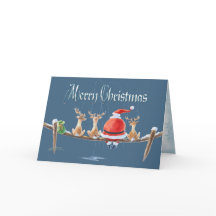 シャロンSHARPE著作のサンタ及びトナカイのfishin及び文字