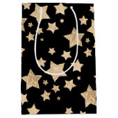 シャンパン金ゴールドグリッタースパークルスターパターンブラック ミディアムペーパーバッグ (正面)