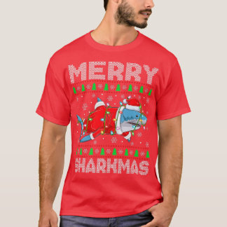 シャークマメリークリスマスライツ醜いサンタシャークキリスト Tシャツ