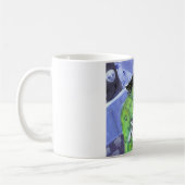 シュナウツァーおよび黒猫のソファー コーヒーマグカップ (左)