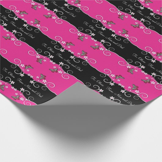 ショッキングピンクおよび黒く渦巻形のな花 ラッピングペーパー (角)